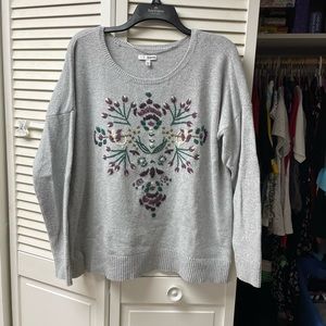 Gray sweater with purple detail on front